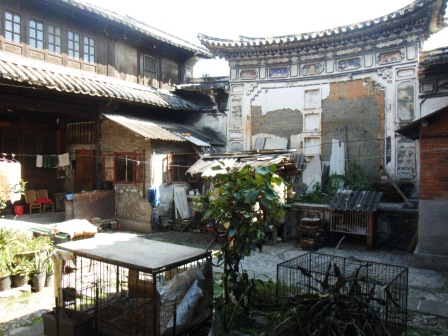 Traditional courtyard with reflecting wall 